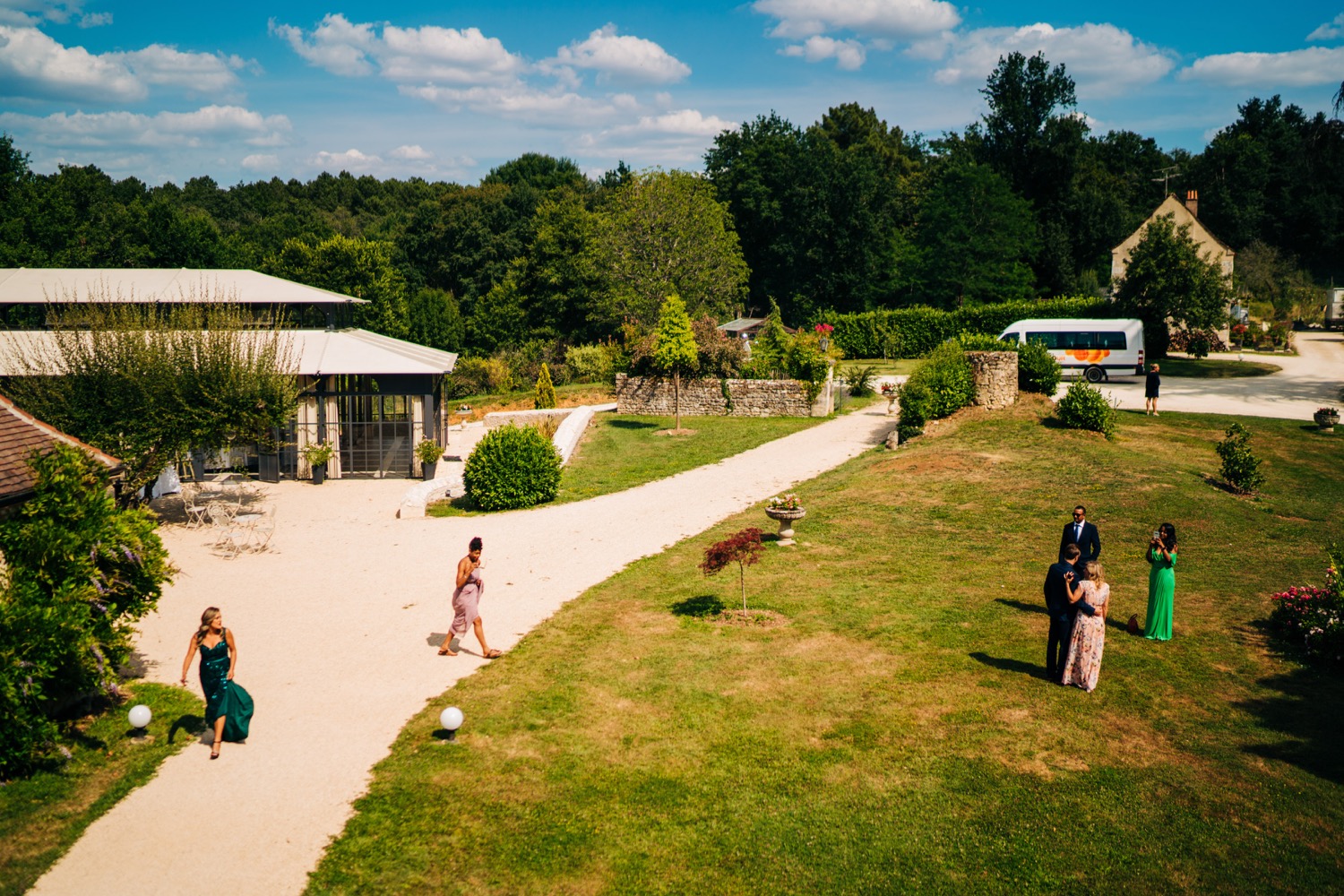 Guests gather for a wedding at Domaine La Fauconnie in South France, Europe, as Magic Wedding Photographer captures photos.
